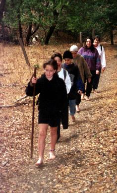 Kids hiking barefoot