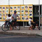 Family out for a barefoot bike ride